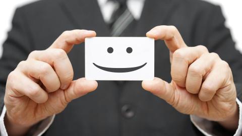 A smile card to represent dealing with difficult clients.